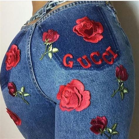 gucci jeans with roses